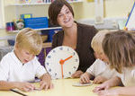 Guided Math lessons meet the needs of students in small group settings like with Telling Time.